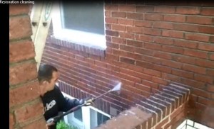 Black Stains being removed from Brick and Tuckpointing work
